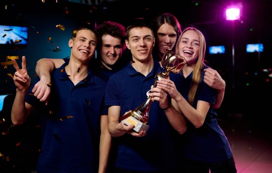 team-of-excited-teenage-participants-of-e-sports-video-gaming-competition.jpg